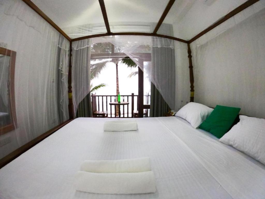 Asa Bay Beach Resort Талпе Экстерьер фото